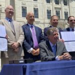 rhode-island-gov.-signs-igt-bally’s-gambling-deal-into-law