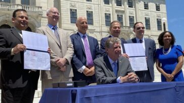 rhode-island-gov.-signs-igt-bally’s-gambling-deal-into-law